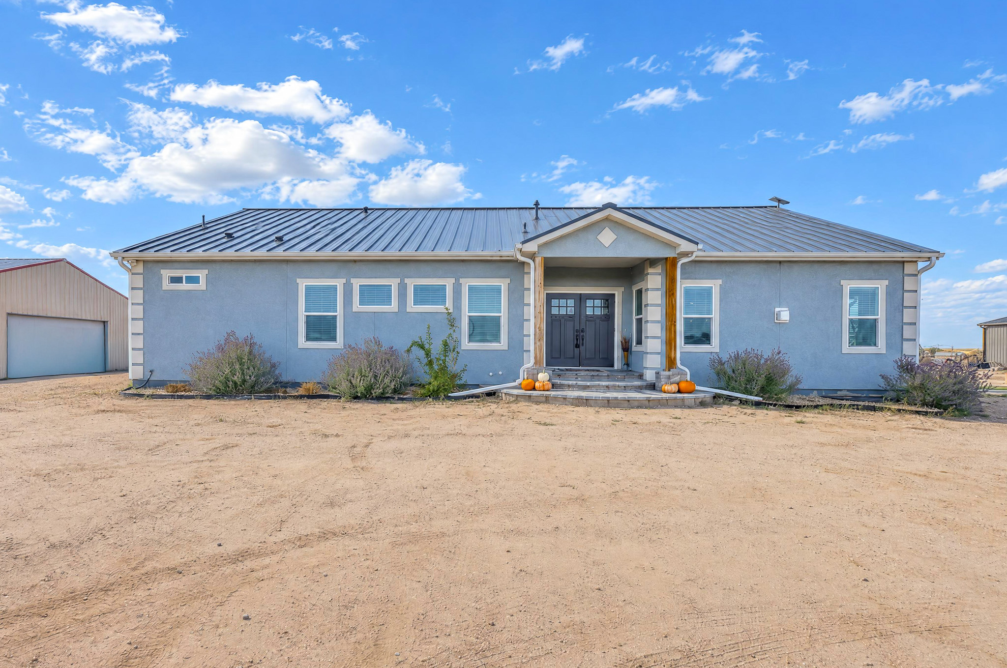 Front Exterior — custom 2023 ranch home on 4 acres in Platteville, Colorado