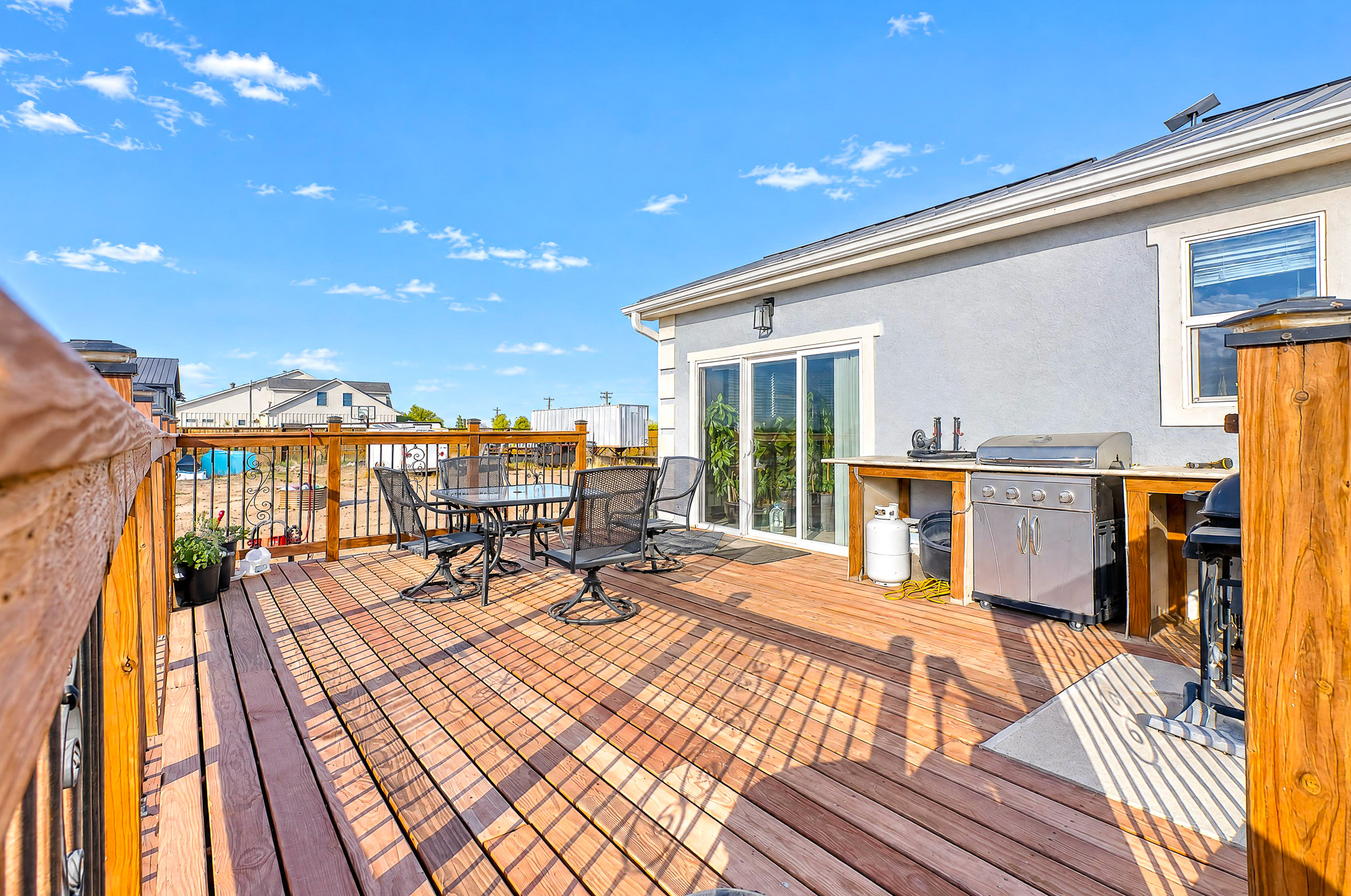 Deck + Grill Area — custom 2023 ranch home on 4 acres in Platteville, Colorado