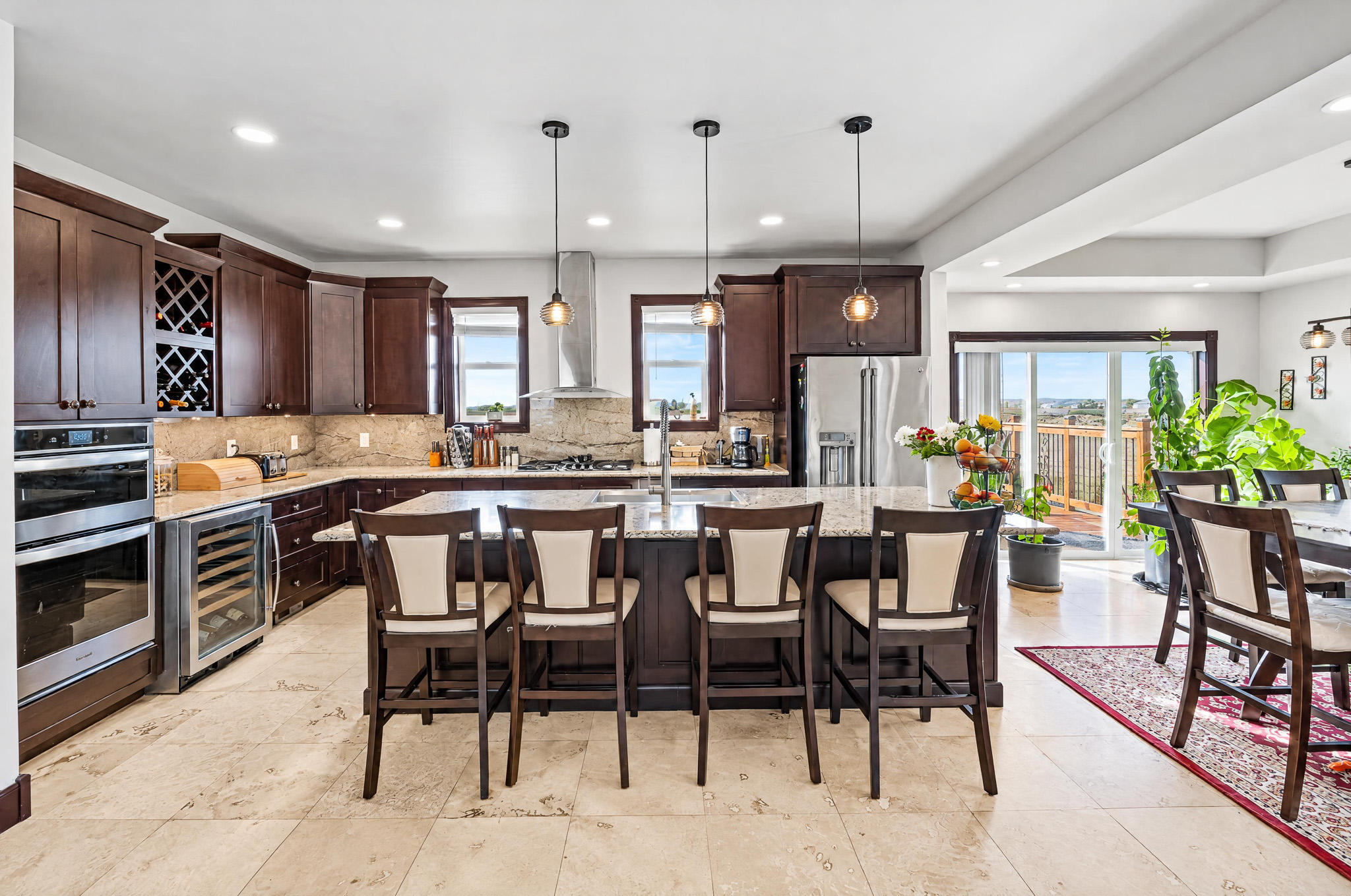 Kitchen + Island — custom 2023 ranch home on 4 acres in Platteville, Colorado