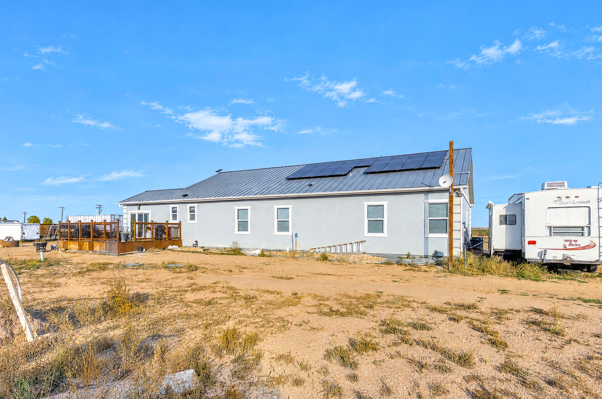 Rear Exterior + RV Parking — custom 2023 ranch home on 4 acres in Platteville, Colorado